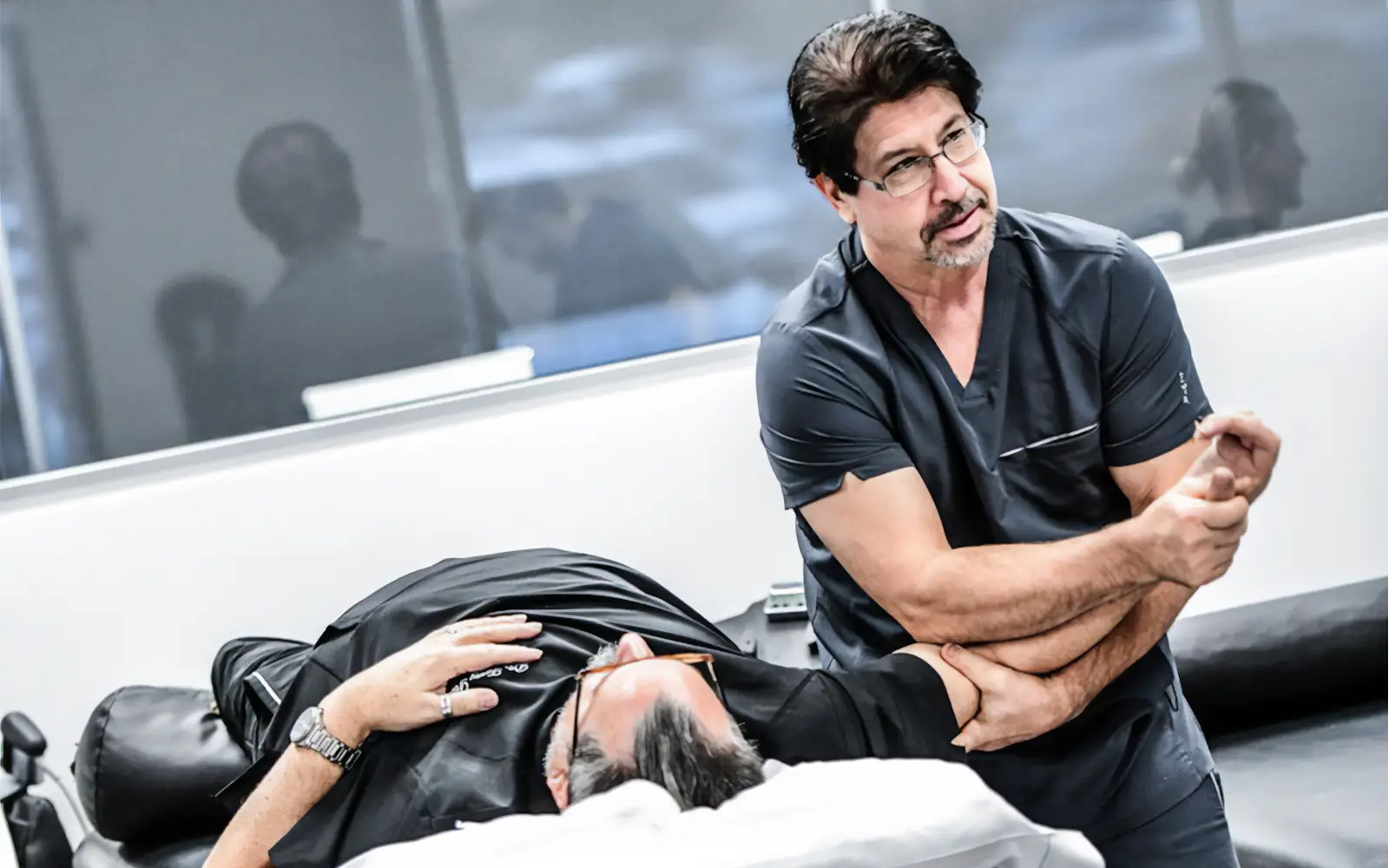 Pain Management Chandler AZ Staff Performing Physical Therapy Pain Management Chandler AZ Staff Performing Physical Therapy