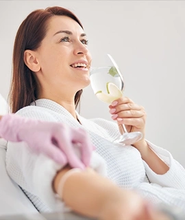 Pain Management Chandler AZ Happy Woman Receiving IV Therapy