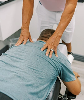 Pain Management Chandler AZ Patient Receiving Chiropractic Adjustment