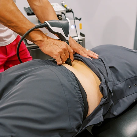 Pain Management Chandler AZ Person Receiving Shockwave Therapy